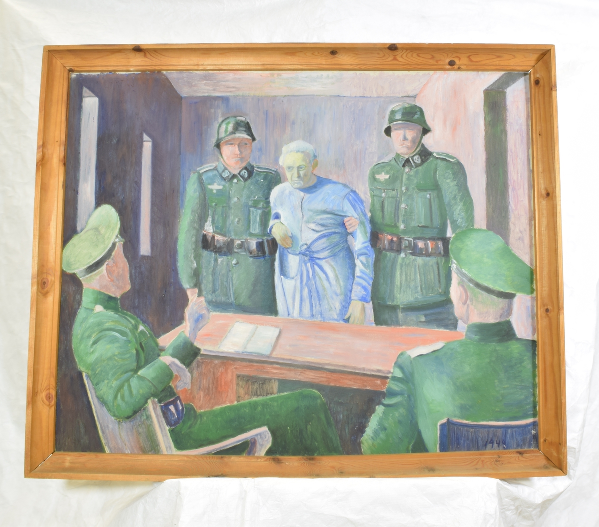 4 menn i tyske uniformer, en fange står mellom to av dem