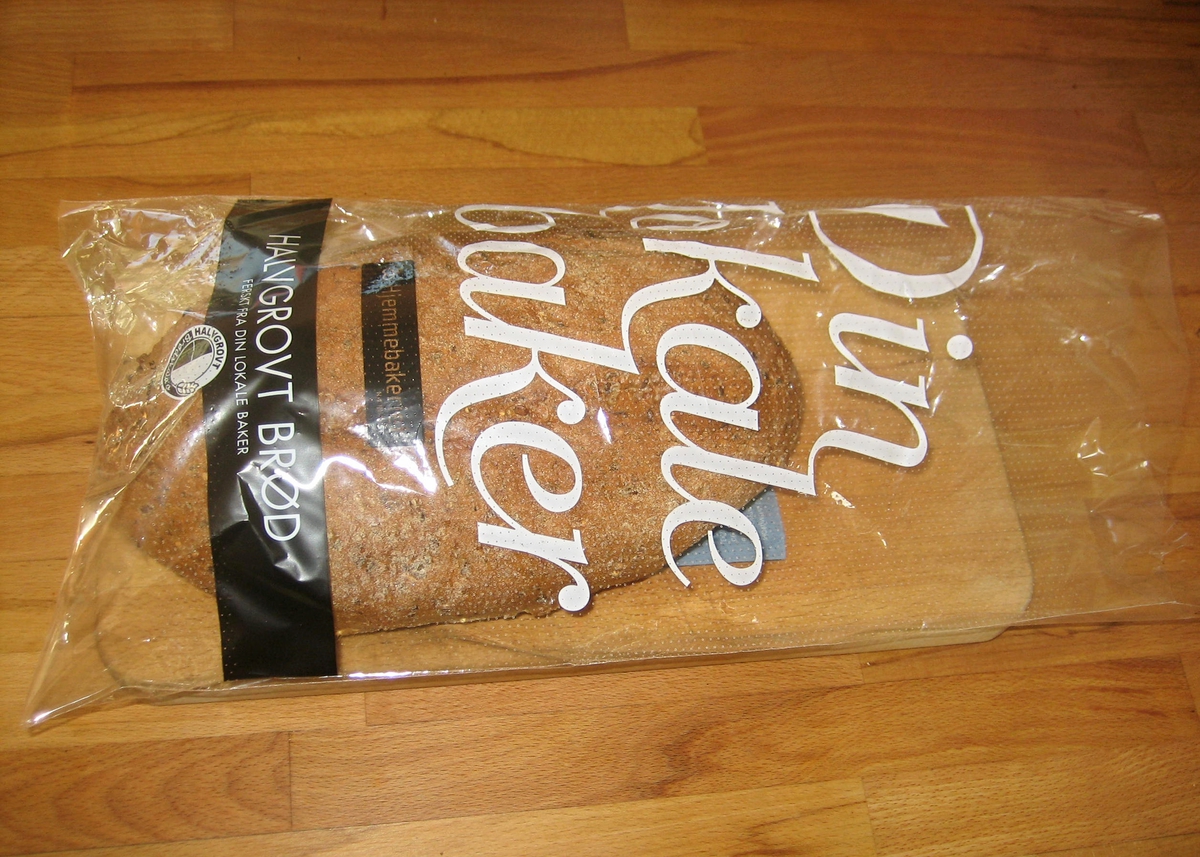 Brødposen er er i plast. Den er merket med Nøkkelhull. Det er satt et klistermerke på brødposen der det står "Har vært fryst best før 21-03-11.