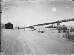 Parti frå Eidsvåg, Stubø Bildet viser Stubø og kirken sett m