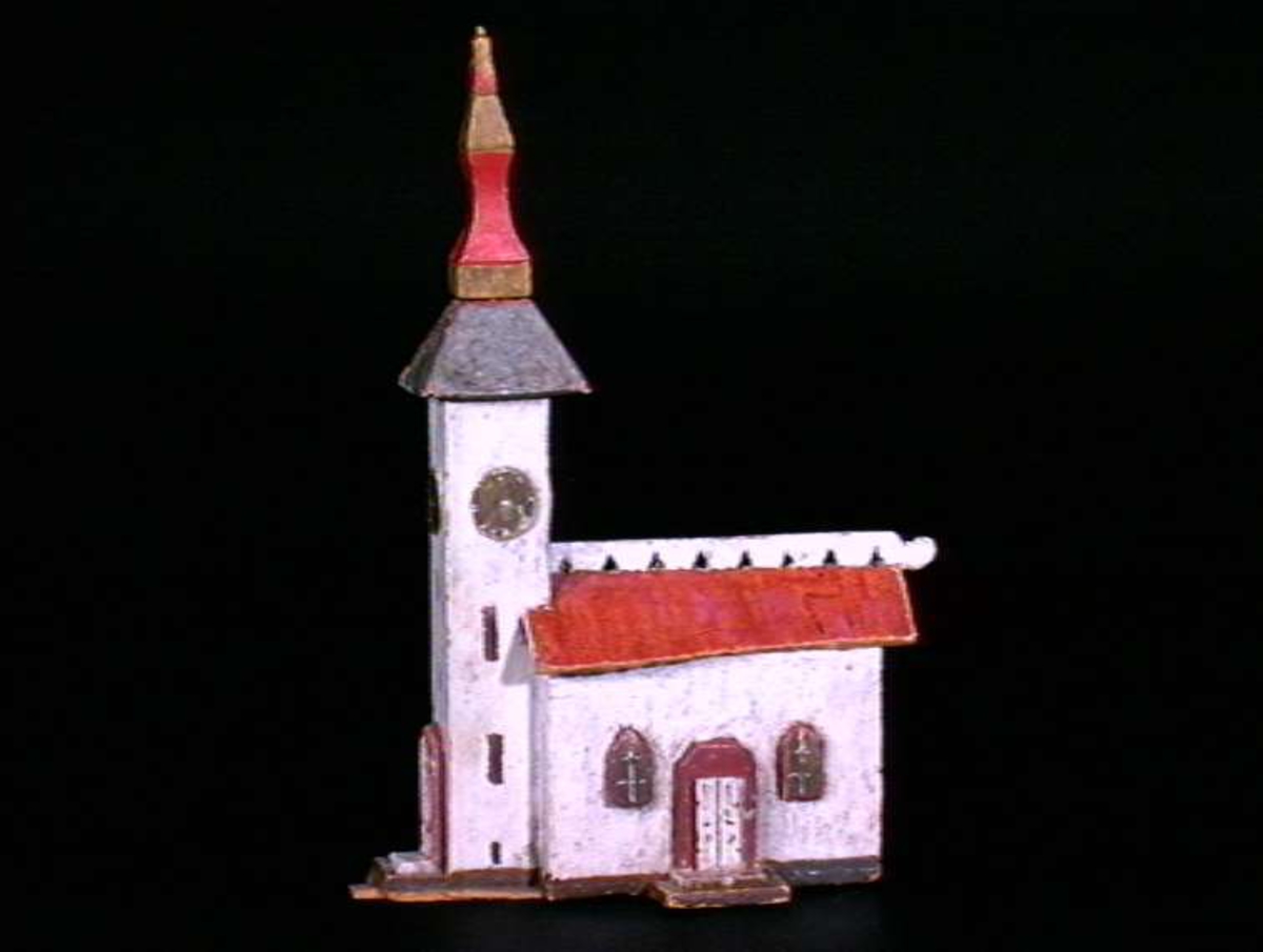 Sett med ca 200 leketøyhus laget av tre i forskjellige former og farger.